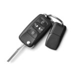 The man holds the car remote control by the smart key, ready to unlock the BMW with just a click.