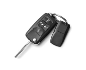 The man holds the car remote control by the smart key, ready to unlock the BMW with just a click.