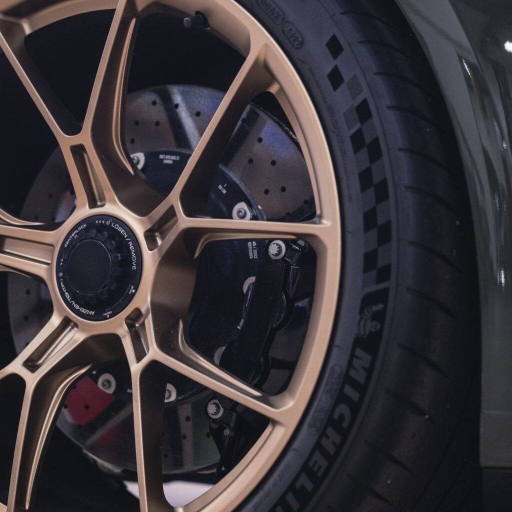 a high performance wheel with a copper finish and sport tires